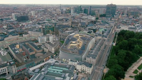 Top down view of Brussels Downtown City Centre with Park and Buildings Skyline. Establishing Aerial panorama of Belgian Capital Bruxelles with typical modern architecture. 4K drone fly over video