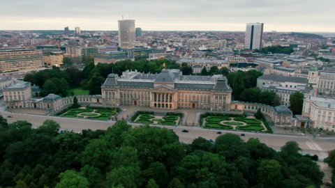 Aerial Shot of Royal Palace of Brussels of the King and Queen of the Belgians in front of Bruxelles Park. Scenic Cityscape of European Capital Cityscape. 4K drone panoramic video