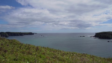 Daytime panorama of the bays on the island of Shikotan, Kuril Islands.