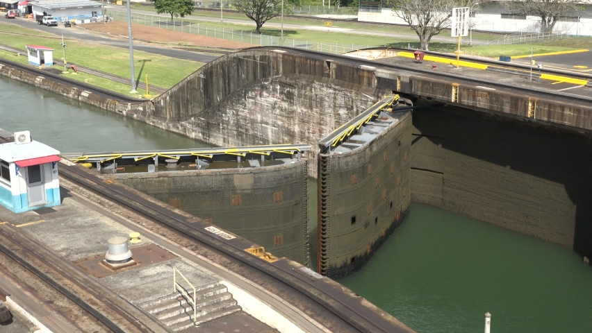 A cargo ship passes through the gates of the Panama Canal.