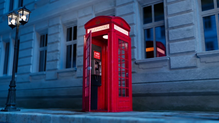 Footage with a British red phone booth with a hanging receiver on the wall. London and English symbol. Old retro communication kiosk on the street with building in the background. Take a call.