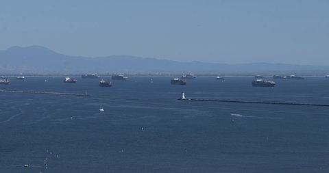 Cargo ships stuck at sea beyond the breakwater at the Port of Los Angeles during a shipping backlog
