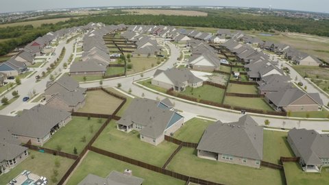 Rockwall, Texas USA - September 29 2021: Aerial view of new home development and neighborhood during housing boom near Dallas in North Texas - 4K Drone