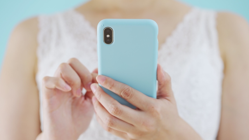 Asian young woman using smartphone