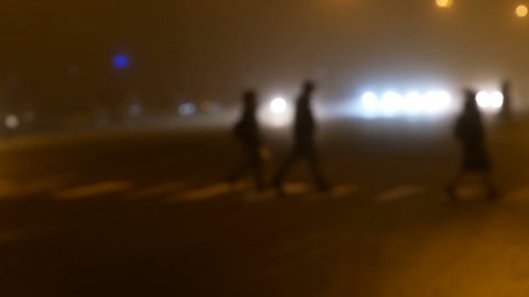 cars drive on the wet road at night, fog, cars light defocus of road, abstract background, blur, bokeh, outdoors