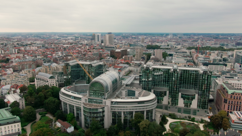 Aerial Panorama of Brussels Skyline. European Parliament Building in Bruxelles, Capital of Belgium, EU. Modern Glass Building. 4K establishing drone zoom in shot with Politics Power Landmark Royalty-Free Stock Footage #1081404278