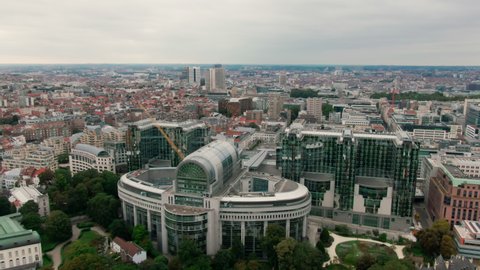 Aerial Panorama of Brussels Skyline. European Parliament Building in Bruxelles, Capital of Belgium, EU. Modern Glass Building. 4K establishing drone zoom in shot with Politics Power Landmark