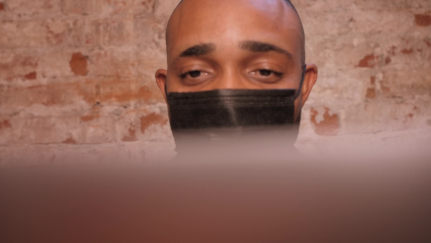 Black Businessman using laptop for analyzing data stock market, stock exchange trading online