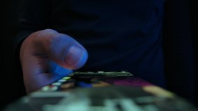 Young Man Look in Mobile Phone and Browse Social Network Close up. Relaxed Adult Male Read App Cellphone at Night. 30s Hipster Online Touch Fingers of Cell Phone Chatting Indoors. Life in Mobilephone - Powered by Shutterstock - Get 15% off with code: PIKWIZARD15