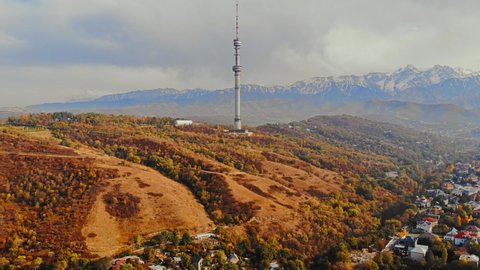 TV tower "Koktobe" from a bird's eye view in the city of Almaty Kazakhstan.  Nice view of the city from the drone. october 20, 2021