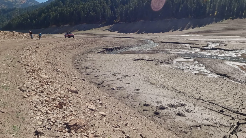 Panning view of the low water levels of Palisades Reservoir during drought at Big Elk Creek in the Fall.