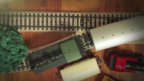 A Model Train on a Junction Switching. Top View. Close Up. 4K Resolution.