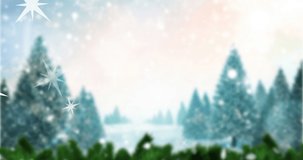Animation of happy holidays text at christmas over winter scenery. christmas, winter, tradition and celebration concept digitally generated video.