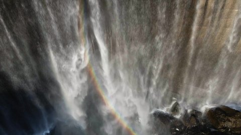 Beautiful Rainbow At Lake Clementine Dam In Auburn, California, USA. - aerial ascend