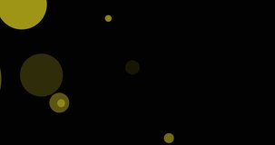 Animation of light spots and confetti on black background. party and celebration concept digitally generated video.