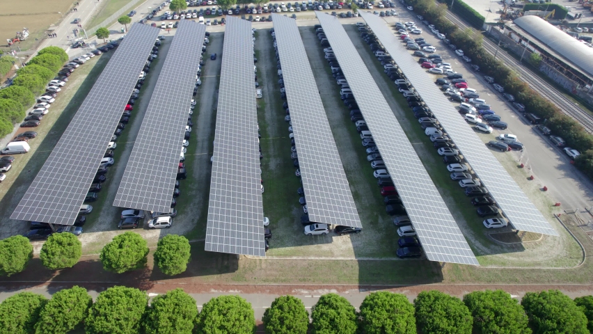 Aerial view of a car park with solar panels. Rimini, Italy. Royalty-Free Stock Footage #1081509539