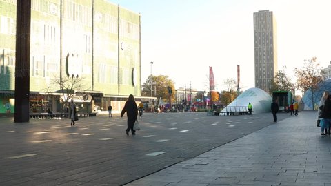 Eindhoven, The Netherlands, October 29 2021. Square in the city centre on the 18 Septemberplein with people walking on a sunny morning