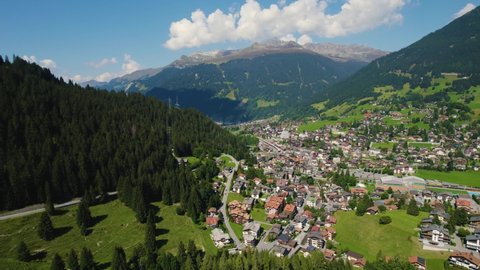 Aerial view of the city Klosters-Serneus in Switzerland on a sunny day in summer.