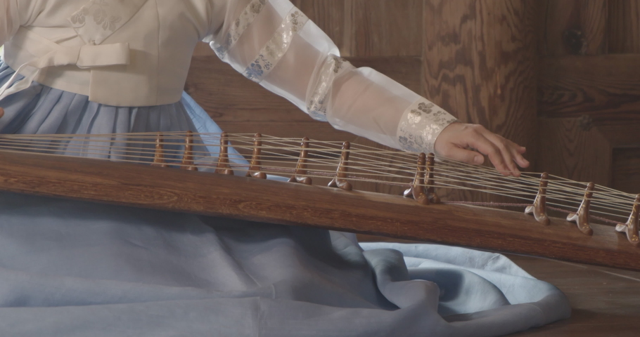 4k Korean traditional instrument gayageum, playing the Gayageum zither | Shutterstock HD Video #1081514726