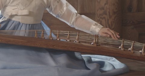4k Korean traditional instrument gayageum, playing the Gayageum zither