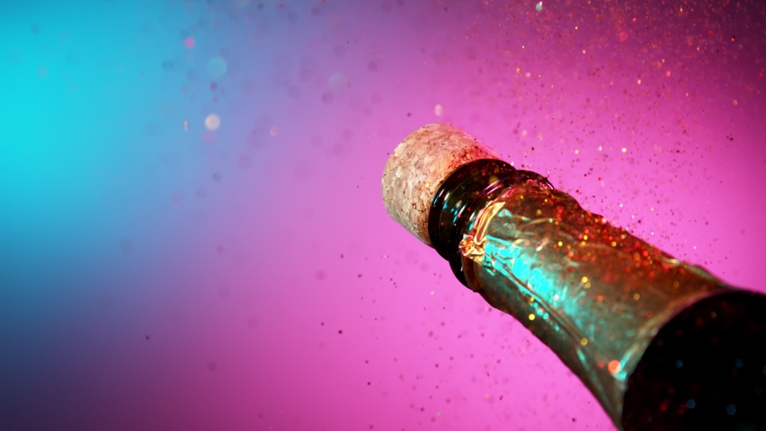 Super slow motion of Champagne explosion with glittering particles. Filmed on high speed cinema camera, 1000fps Royalty-Free Stock Footage #1081519064