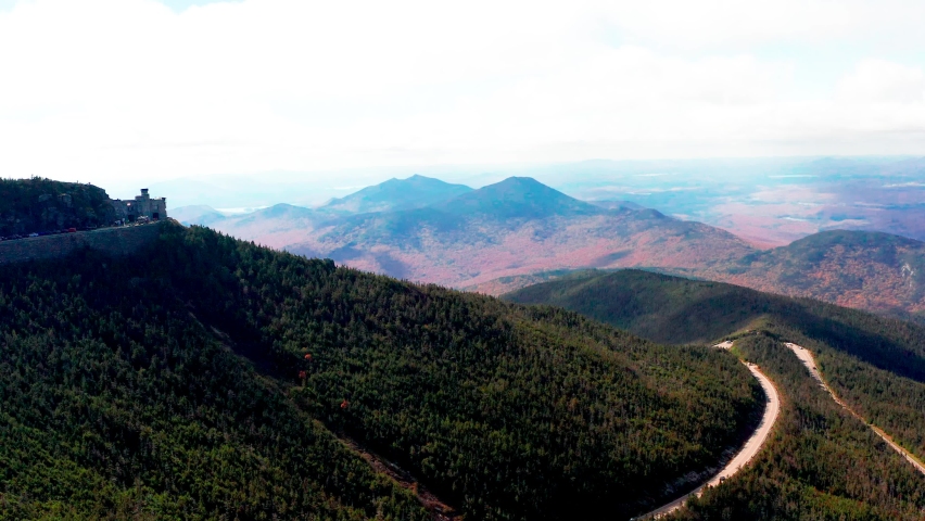 Aerial video of Whiteface Mountain and Lake Placid during autumn in the Adirondack Mountains of New York.