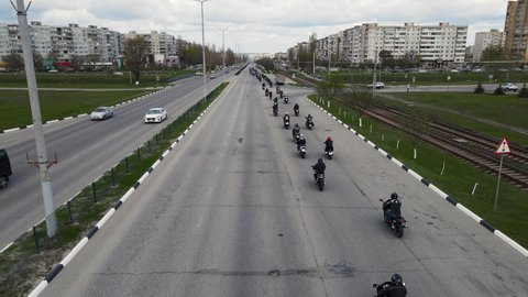 many motorcycles are driving along the road in the city center Moscow Russia May 10, 2021