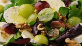 Italian salad with goat cheese, grapes and walnuts. Olive oil. Healthy Food. - Powered by Shutterstock - Get 15% off with code: PIKWIZARD15