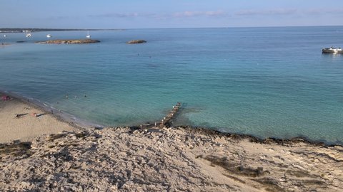 Formentera island beach crystal clear blue sea water drone aerial beautiful tropical