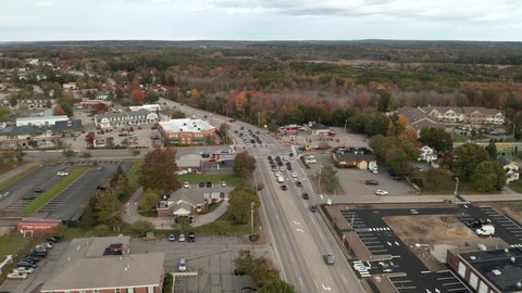 Wide angle drone shot flying overtop Scarborough, Maine's downtown.