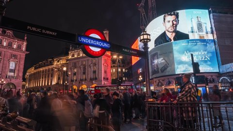 London, UK. May 10, 2021. London Time lapse of the London underground Subway sign at the Piccadilly Circus. People rushing in and out of the subway. London movement.