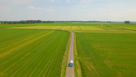 Heerde , Gelderland , Netherlands - 10 29 2021: Classic Volskwagen van driving through countryside, aerial view