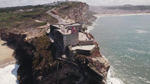Fortress of Saint Michael the Archangel, Nazare. Tourist landmark Silver Coast, Portugal. Dolly out 