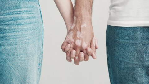 Young Couple Woman and Man Joining Hold of Hands Close up. Two Adult Person Girl and Guy Join Fingers Each Other. Sensual Connecting of Loving. Concept Real Trust People. Tender Happiness Bonding 4k