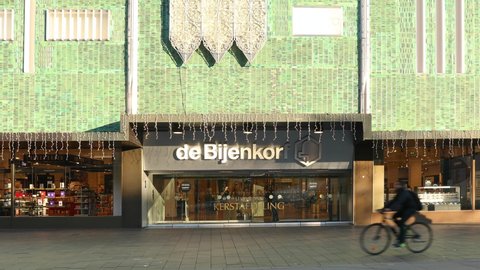 Eindhoven, The Netherlands, October 29 2021. Bijenkorf retail store entrance in the centre with luxury goods on a sunny day. Dutch warehouse