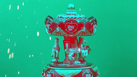 toy carousel music box with green background and turquoise horses, , while snow falls with sparkles, slow motion, 