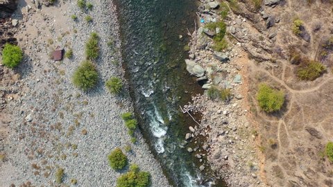 The American River flows through the Auburn Recreation Area not far from Sacramento, California. This beautiful area is used for mountain biking, hiking, gold panning, and just plain relaxing.