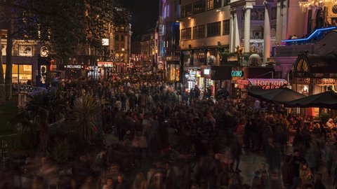 London, UK. September 13, 2021. Time lapse of crowds of people near Piccadilly Circus in London - landmark and famous shopping destination. Casino crowd in London.