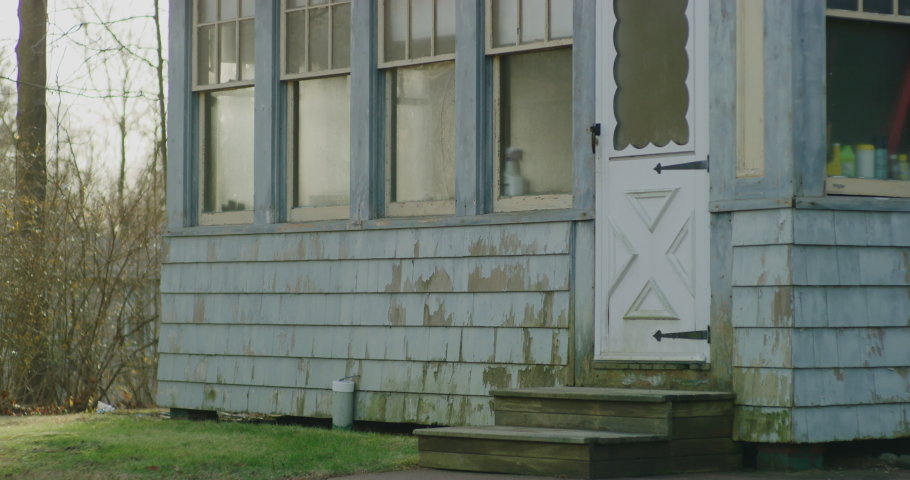 Close up of a traditional New England Home during winter time in Branford, Connecticut. Filmed with a Red Helium-8K resolution-vintage Zeiss lenses.