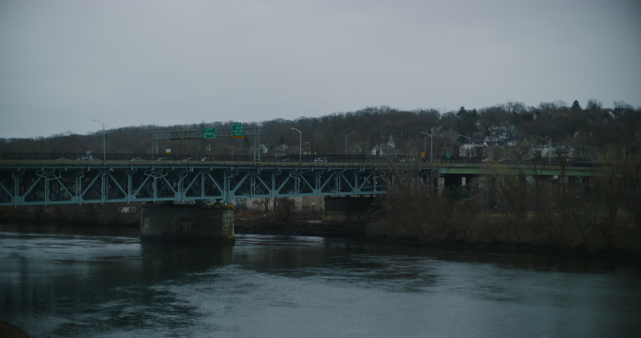 Connecticut Route 8 over the Housatonic River during winter time in Derby, Connecticut. Filmed with a Red Helium-8K resolution-vintage Zeiss lenses.