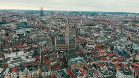 Establishing Aerial Shot of Brussels Skyline, Capital of Belgium. The Grand Place - picturesque old square in Europe. Popular tourist destination with medieval architecture. 4K drone panoramic video