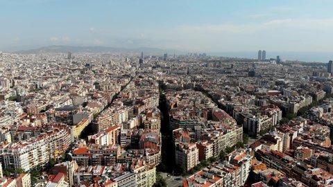 Drone shot Barcelona. Dense development in Barcelona. Aerial view of a city in Spain. Panoramic view of the city of Barcelona. Spain from drone.