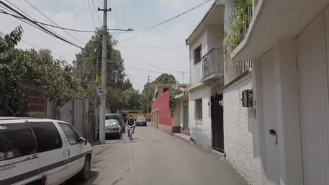 Mexico city , xochimilco , Mexico - 07 23 2020: riding bike on the street, xochimilco