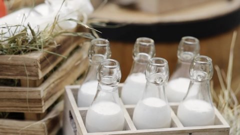 milk in a glass bottle, an organic farm dairy product for healthy nutrition