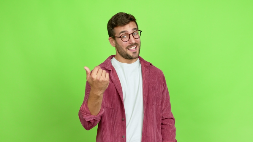 Handsome man with glasses presenting and inviting to come with hand over isolated background | Shutterstock HD Video #1081654169