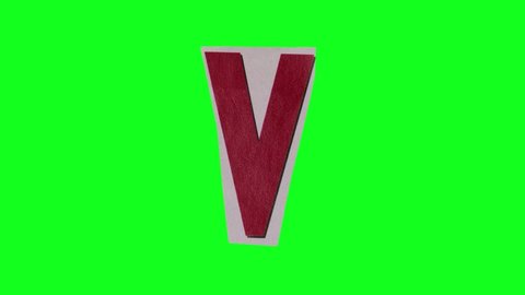4K Stop Motion - paper with letter V moving on green screen background. More elements in our portfolio