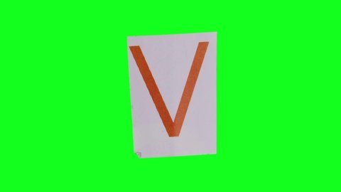 4K Stop Motion - paper with letter V moving on green screen background. More elements in our portfolio