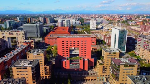 Aerial view of a group of buildings, University of Bicocca Sociological Research Zone. New buildings in the city. Theater Archimboldi Alla Scala. Residential complex Milan, Italy, November 2021. 