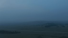 Foggy aerial footage of a mountain town and roads. Erie cinematic footage .