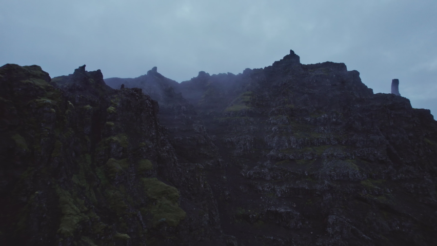 Wide Drone Flight From Misty Mountain Peak Of Black Rock, Iceland Royalty-Free Stock Footage #1081686887